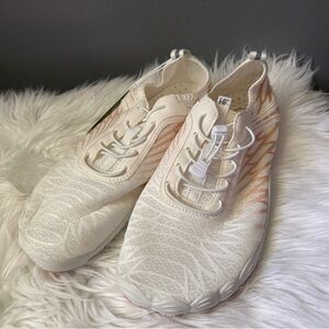 Women's Cream Slip-On Knit Sneakers with Subtle Peach Detail